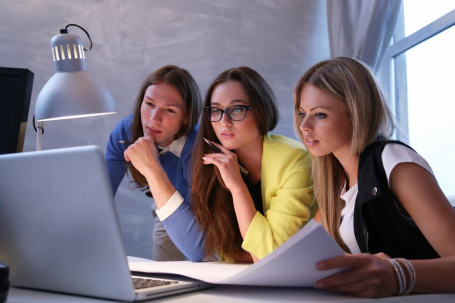 Financial analysis workspace with documents and calculator